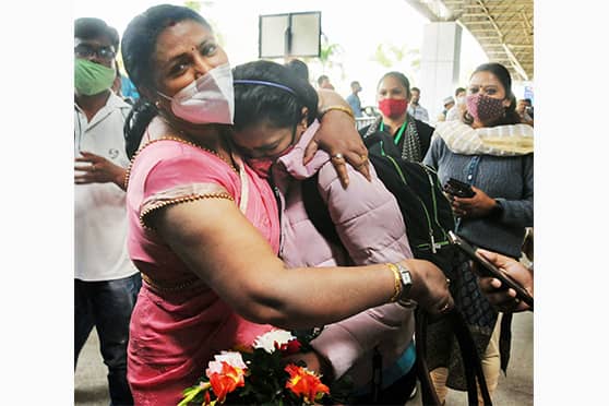 An Indian student evacuated from Ukraine reunites with her family members on her arrival at Birsa Munda International Airport in Ranchi. 