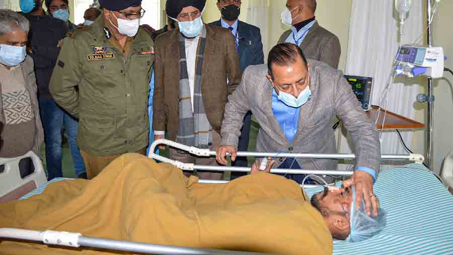 Union minister Jitendra Singh interacts with an injured at a hospital near Jammu 