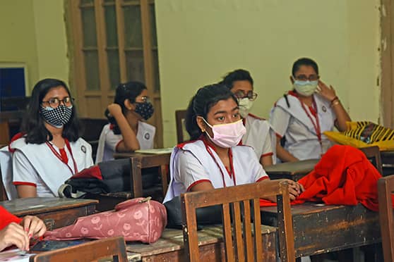 Students wait for their turn at Bethune Collegiate School. “We have begun the drive with 60 lakh Covaxin doses for this age group. A total of 48 lakh teenagers are eligible,” a health official told PTI. All those born before 2007 will be eligible for vaccination, according to the guidelines issued by the Union health ministry recently.