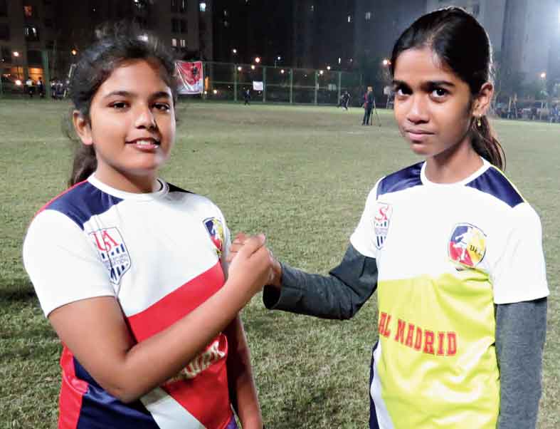 Girl Power: Garima Goswami of Atletico de Madrid and Urbee Chatterjee of Real Madrid before the match.