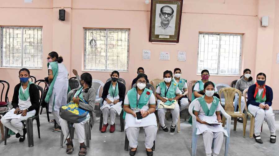 Students wait to get vaccinated at Taki Government School in Sealdah on Friday.  