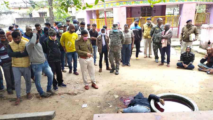 Police investigating the spot where the dead body of Jaidev Pandey was found