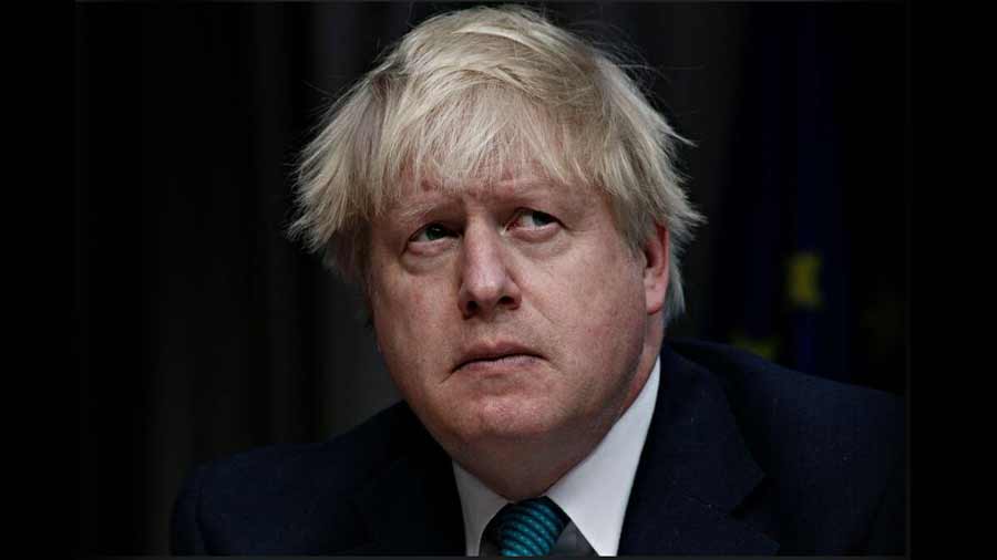 Boris Johnson denies allegations that he was drenched in champagne during his back garden party