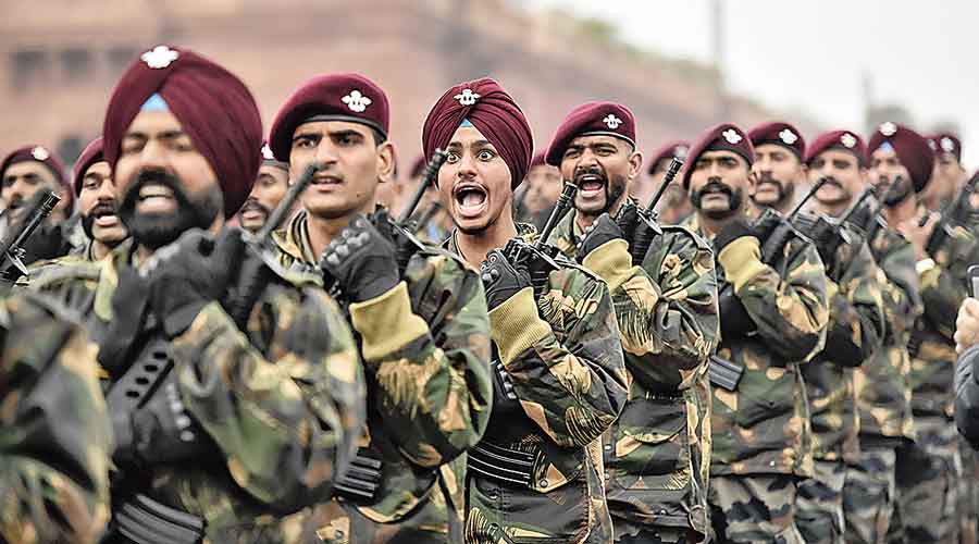 Commandos march during the rehearsal for the upcoming Republic Day parade  in New Delhi on Monday.