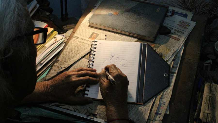 Debnath drawing a bust of his famous creation, Bantul the Great