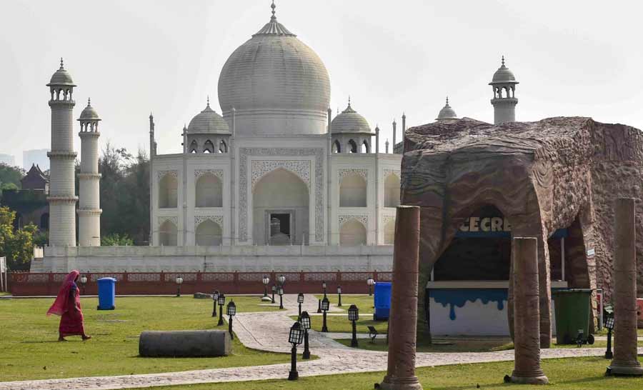 TAJ WAITS: A worker walks past a replica of the Taj Mahal inside a deserted Eco Park on Sunday, January 16. Amid concerns over the rapid spread of the Omicron variant of COVID-19, the Bengal government has extended the ongoing public place shutdown restriction till January 31