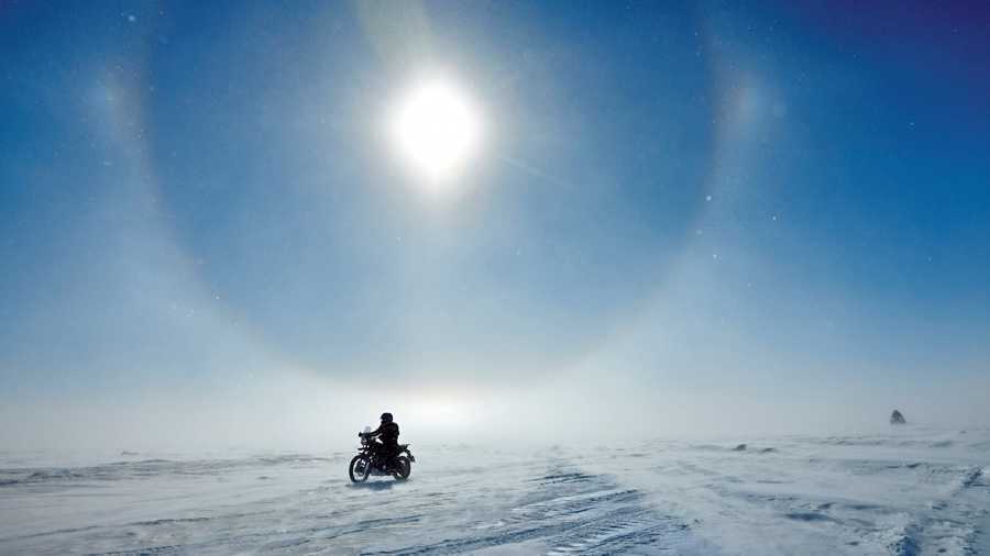Near summer solstice in Antarctica the sun doesn’t set. It just goes round in circles at a level about halfway up to high noon and has a rainbow coloured halo around it.