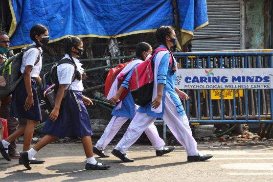 School students on Day 1 of offline classes in West Bengal on November 16. 