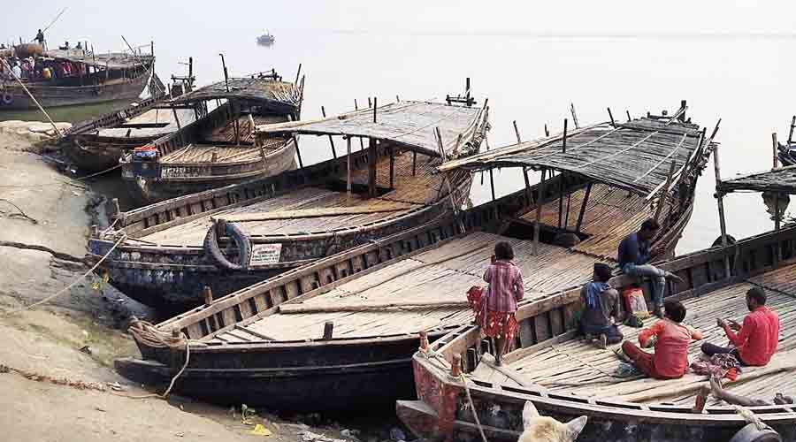 Empty boats anchored on the bank of the Ganga at Manikchak Ghat in Malda on Sunday.
