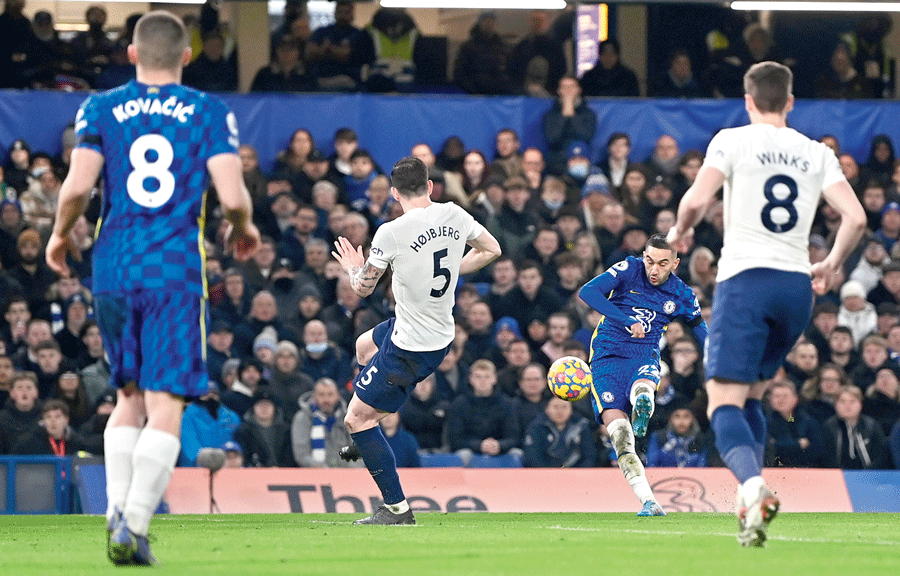 Hakim Ziyech scores Chelsea’s first goal during the Premier League match against Tottenham on Sunday. 