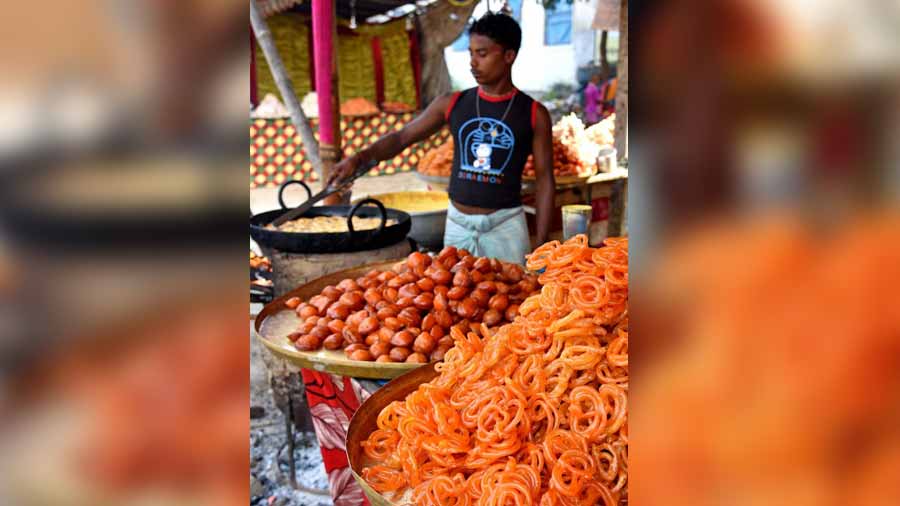 Heaps of 'jalebis' can be seen piled up on carts at every local mela