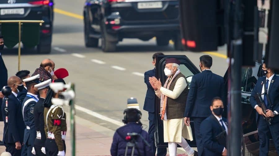 Prime Minister Narendra Modi is greeted by Rajnath Singh upon his arrival at Rajpath for the Republic Day parade.