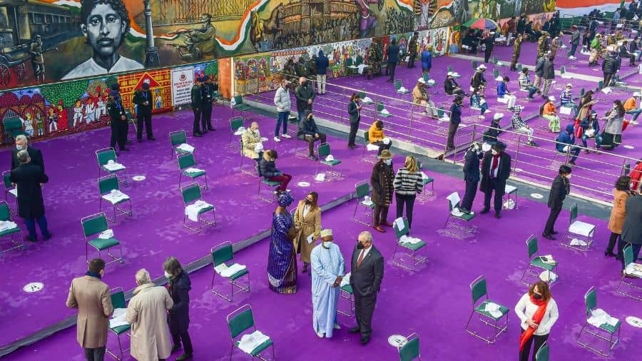 Delegates wait to witness the ceremonial Republic Day Parade