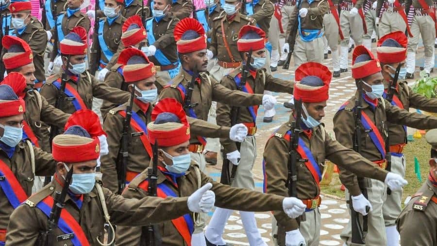 Police personnel march past during the 73rd Republic Day celebrations, in Moradabad, UP.