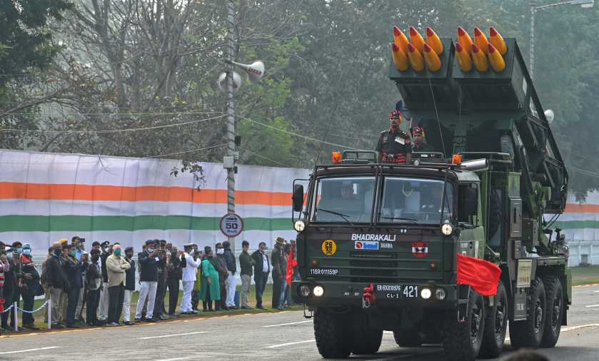 A jawan displays Armoured Scout Car on Red Road.