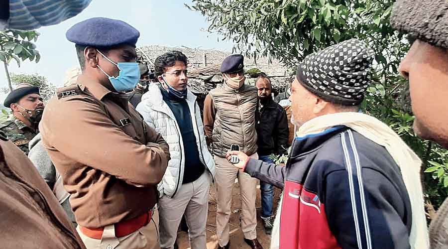 Buxar district administration and police officials visit Amsari village on Thursday after the deaths.