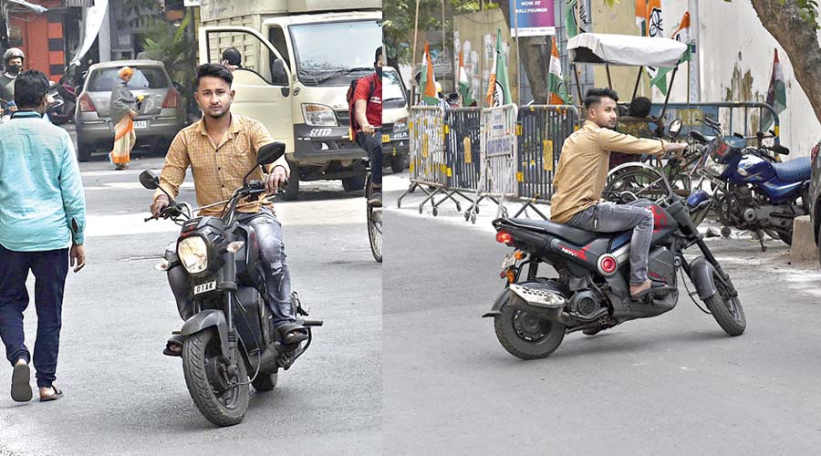 A helmet-less biker spots police on Dilkhusa Street near Quest Mall and (below) takes a U-turn. The police were announcing the new fines for bike-related violations around 12.30pm on Thursday. Several others riding two-wheelers were seen taking a detour through lanes and bylanes to avoid being caught. Cops saw the bikes take U-turn but continued with their awareness drive. There was no effort to stop the bikes. Metro also saw at least one biker return with a helmet on and pass through the police post. 