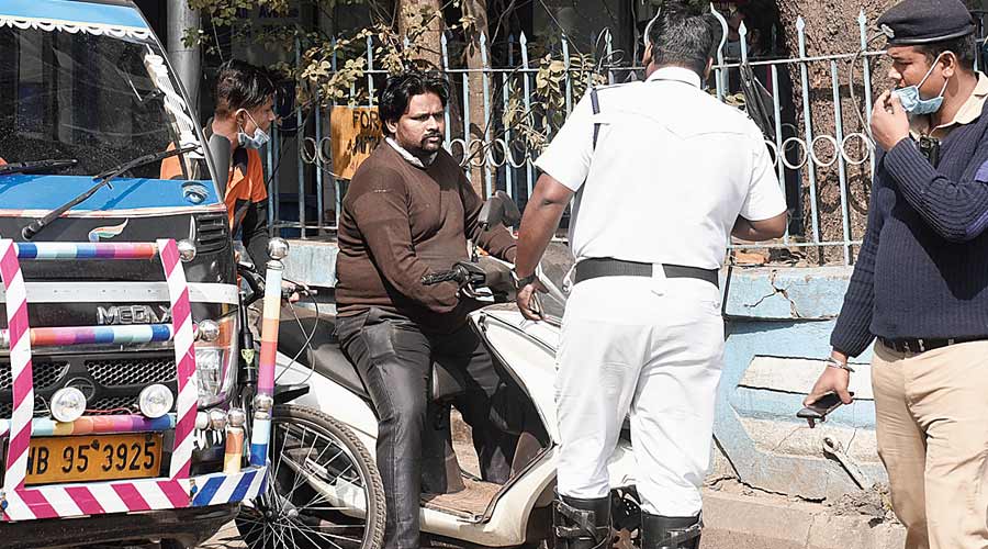 Police stopped a man on a two-wheeler on Syed Amir Ali Avenue near Park Circus because he was not wearing a mask. “I am going to a nearby place… I will wear it,” he said.