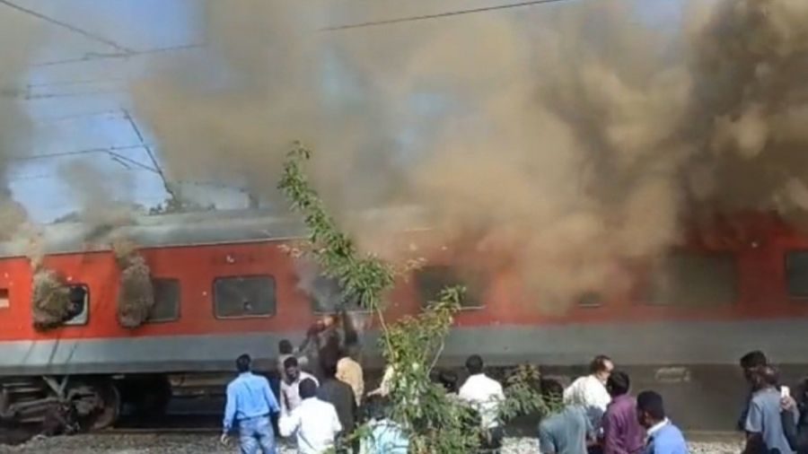 Smoke billowing out of the Gandhidham-Puri Express. 