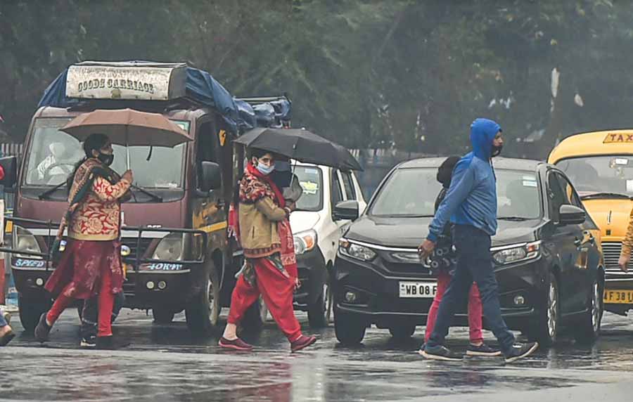 RAINY HANGOVER: Vehicles ply on a Kolkata thoroughfare on a rainy Sunday, January 23. After a couple of cloudy days at the beginning of this week, a chilly spell arrived in the city on Friday morning. The next couple of days are likely to be colder. However, another western disturbance is likely to emerge by next weekend which will most likely trigger some rain in Kolkata and neighbouring areas on February 4 & 5, according to the Met forecast