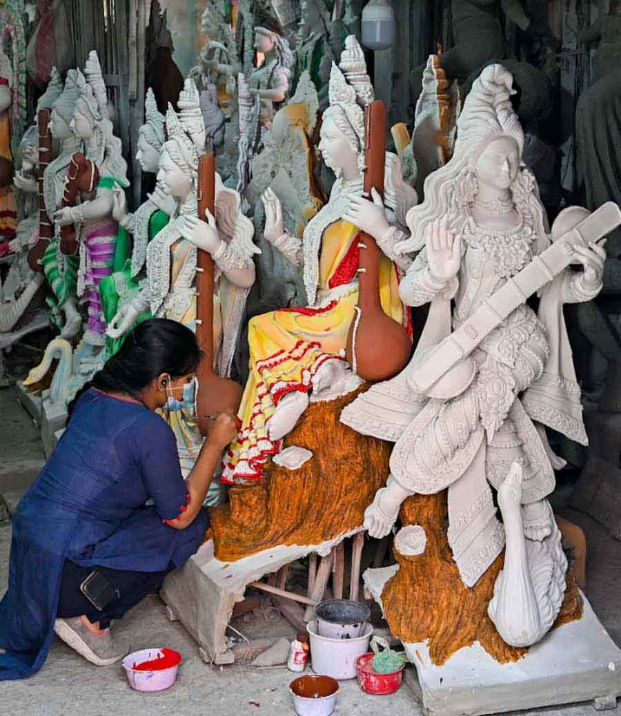 KNOWLEDGE DEITY: An artisan in north Kolkata’s Kumartuli neighbourhood paints an idol of goddess Saraswati on Tuesday, January 25. The goddess of learning in Hindu mythology is worshipped across the state with fervour and enthusiasm by students and their parents alike. Saraswati Puja falls on February 5 this year