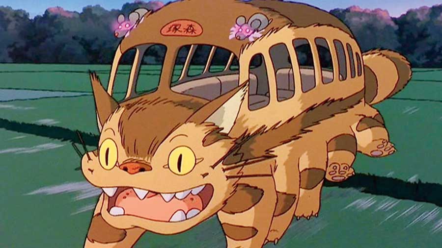 The famous catbus from My Neighbour Totoro with its flashing lights and wide smile