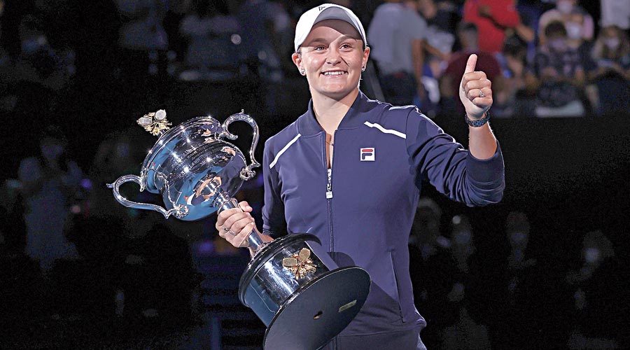 Ashleigh Barty acknowledges the crowd at the Rod Laver Arena on Saturday after winning the Australian Open women’s singles final against Danielle Collins. 