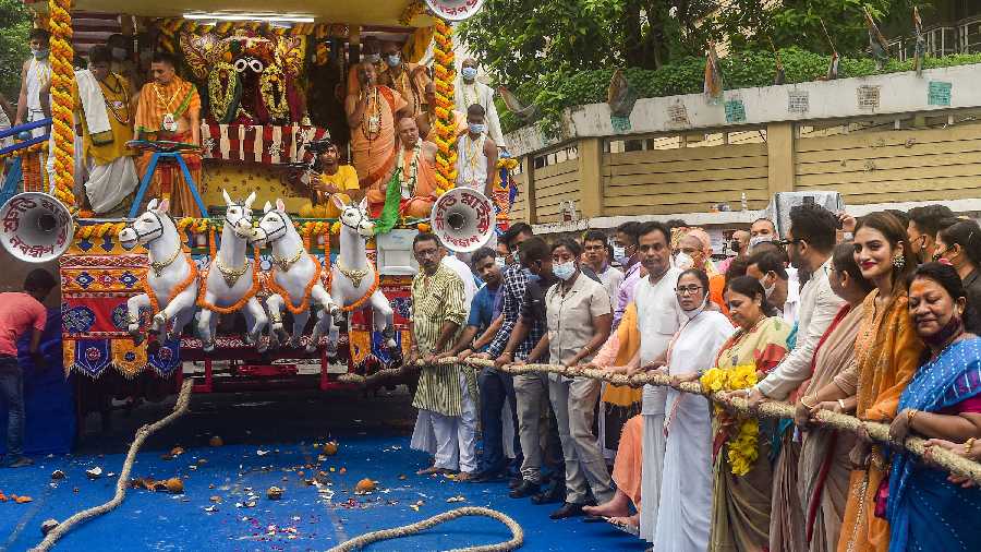 West Bengal Chief Minister Mamata Banerjee with TMC MP Nusrat Jahan and others pulls the chariot during the 51st ISKCON Ratha Yatra in Calcutta