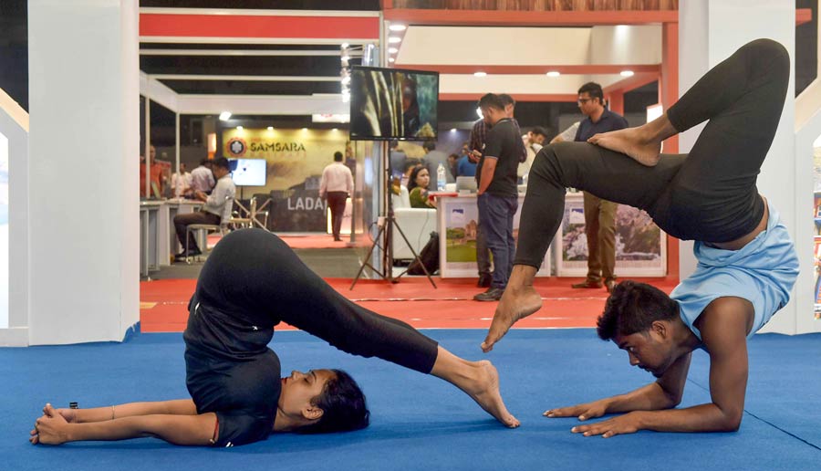 A yoga session in progress at the Uttarakhand stall at the Travel and Tourism Fair at Biswa Bangla Convention Centre in New Town on Friday. The fair will continue till July 3.