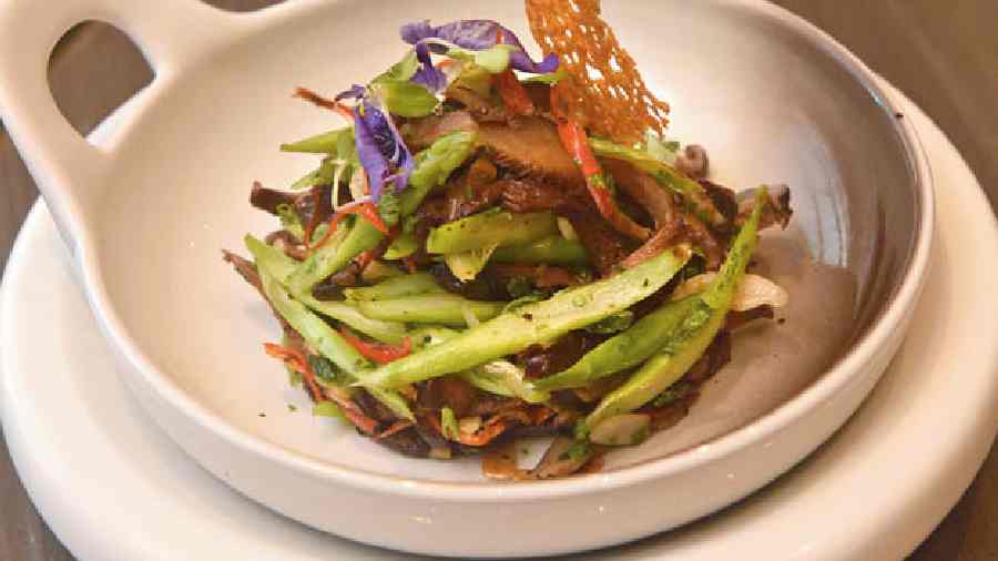 Tossed Asparagus and Shiitake is a healthy and crunchy dish with shiitake mushrooms, chilli asparagus tossed with garlic and spices.