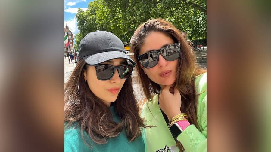 Karisma Kapoor: The Kapoor sisters are back together. In the photo posted by Karisma Kapoor, she and Kareena Kapoor  are twinning in matching black sunnies.