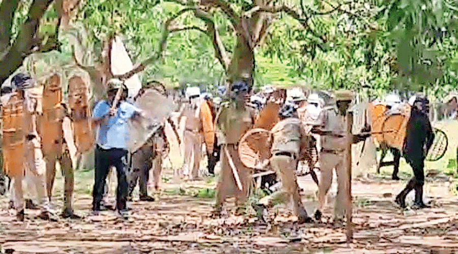Villagers and police clash in Farakka on Saturday.