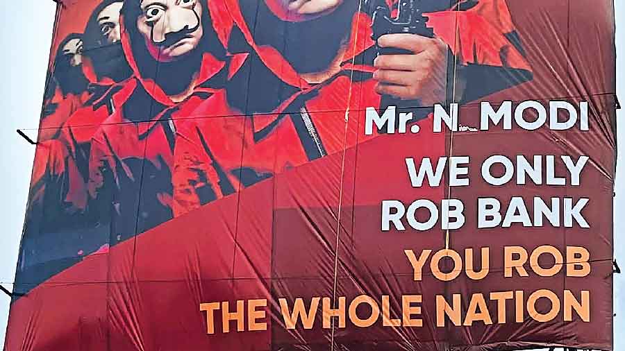 A tweet by TRS social media convener Satish Reddy on Friday shows a billboard, with images resembling the characters in Money Heist, that screams: Mr. N Modi,  we only rob bank, you rob the whole nation