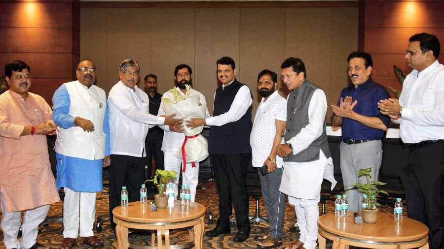 Maharashtra CM Eknath Shinde with Deputy Chief Minister Devendra Fadnavis and rebel MLA,s during first Joint Meeting of Shivsena BJP at a hotel in Mumbai