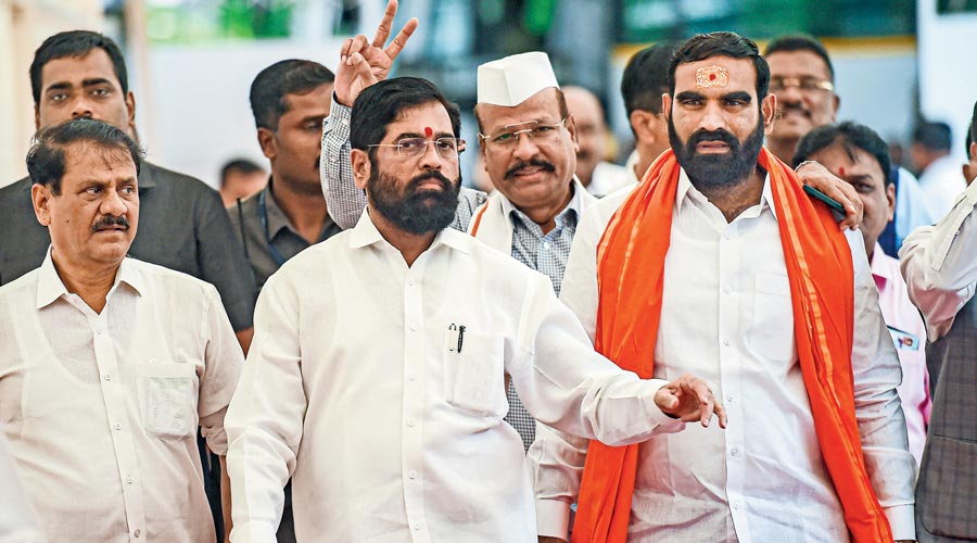 Eknath Shinde with rebel Shiv Sena MLAs during the special session of Maharashtra Assembly  on  Monday.