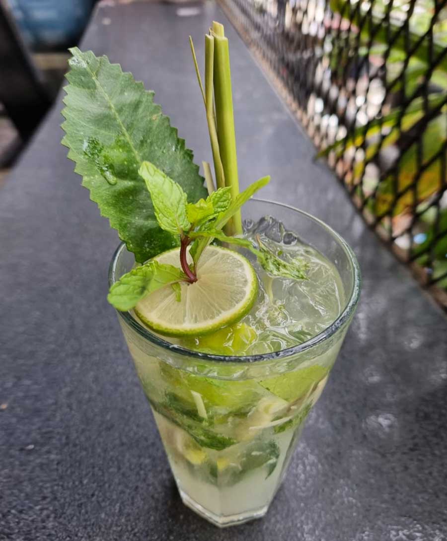 Kafir Lime Spiced Mojito (134 calories, approx) – Scrapyard: The fizzy drink has a smooth white rum base and features kaffir lime leaves, lemongrass and lime, topped with crushed ice and soda