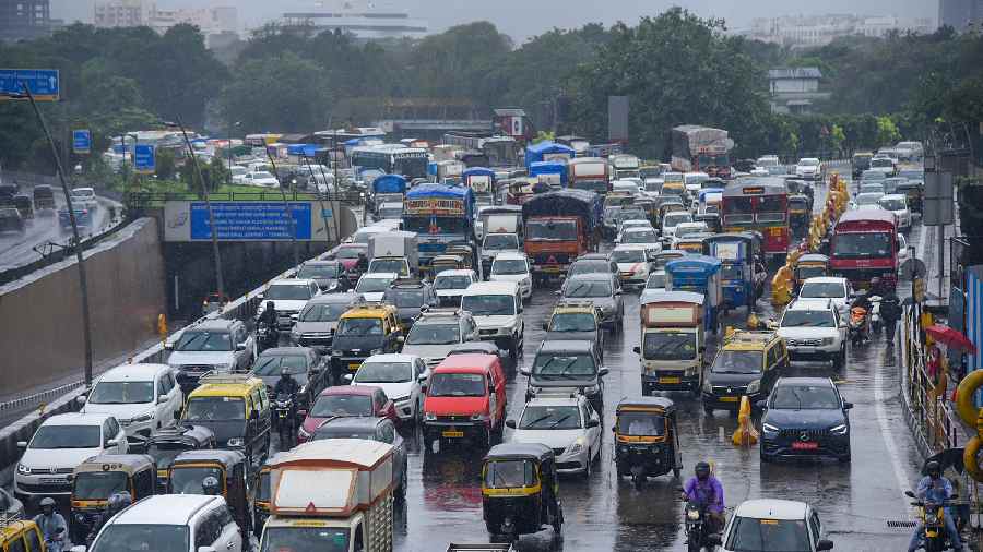 Vehicles stuck in a heavy traffic jam on Western Express Highway following monsoon rains