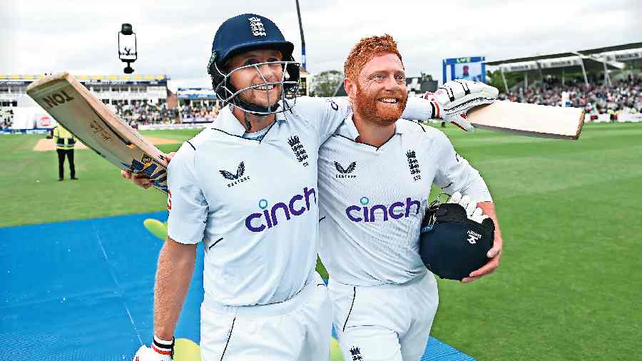 Joe Root and (right) Jonny Bairstow after winning the rescheduled fifth Test against India and drawing  the series at Edgbaston on Tuesday.