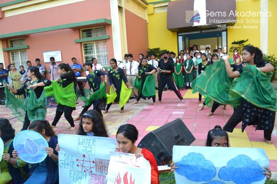 Students performing dance to highlight the need of planting more trees at Gems Akademia International School, Kolkata. 