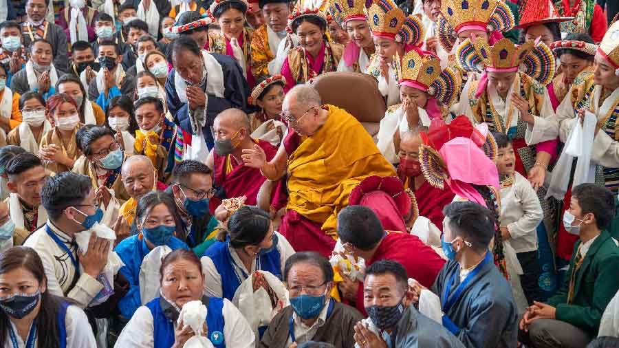 The Dalai Lama interacts with his followers
