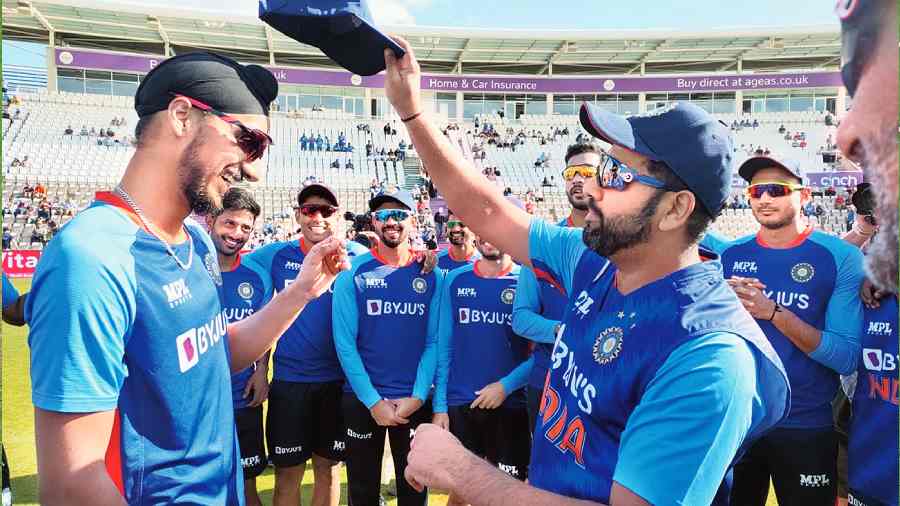 India captain Rohit Sharma presents pacer Arshdeep Singh his India cap ahead of his debut in the  first T20I against England at the Ageas Bowl in Southampton on Thursday. 
