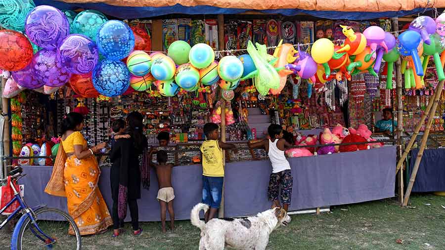 Traditional wooden toys have been replaced by plastic ones at the ‘rather mela’ stalls