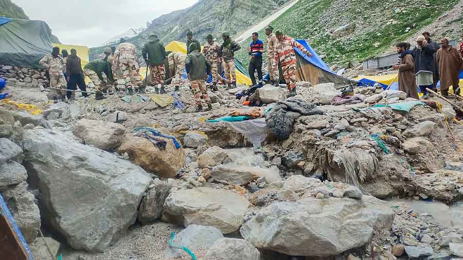 TBP teams carry out rescue work following flash floods triggered by cloudburst, near the Amarnath cave shrine