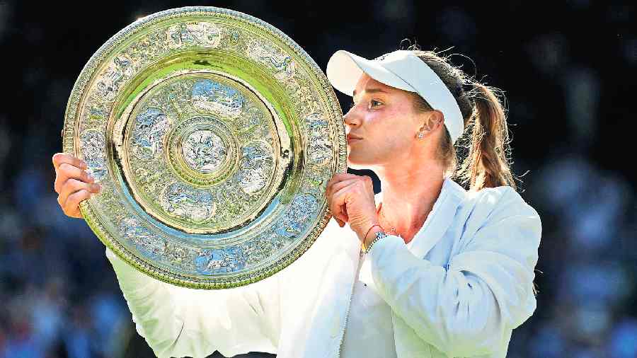 Elena Rybakina kisses the Wimbledon women’s singles trophy after beating Tunisia’s Ons Jabeur in the final, and becoming the first Kazakhstan player to win a grand slam singles title, on Saturday. 