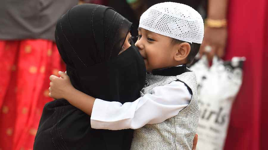Muslim devotees after offering prayers on the occasion of Eid al-Adha, at Don Bosco School, in Chennai