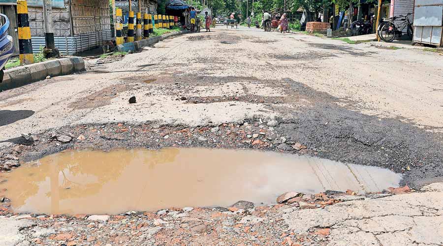 Potholed stretches of Anandapur Road, between Heritage School and Basanti Highway, on Monday