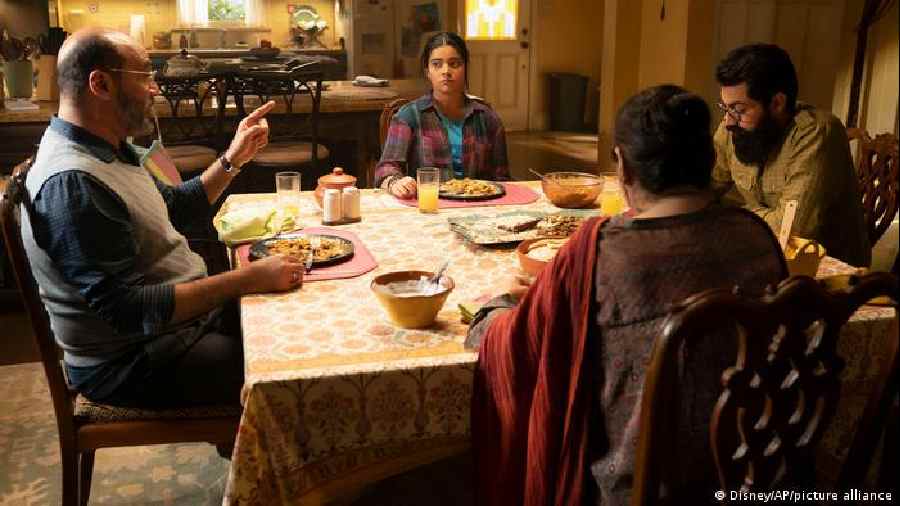 Kamala's traditional South Asian immigrant family gathers around the table for dinner in the miniseries