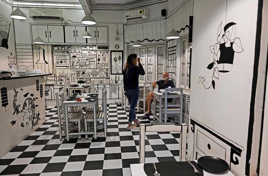 The monochromatic sketches on the walls of the restaurant that create a sense of optical illusion were painted from scratch by Somoshree and her friends 