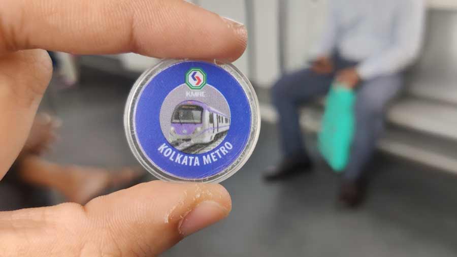 The new token bears the fresh look of the East-West Metro
