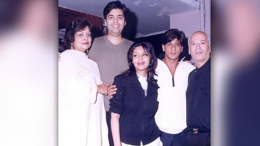 Karan Johar with his parents Yash and Hiroo Johar. Sharing the frame are Shah Rukh Khan and Gauri Khan, reminding us of all KJo-SRK movies.